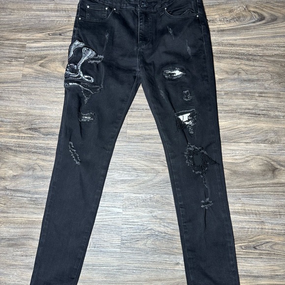 Men's Black Distressed Jeans Amiri cobra